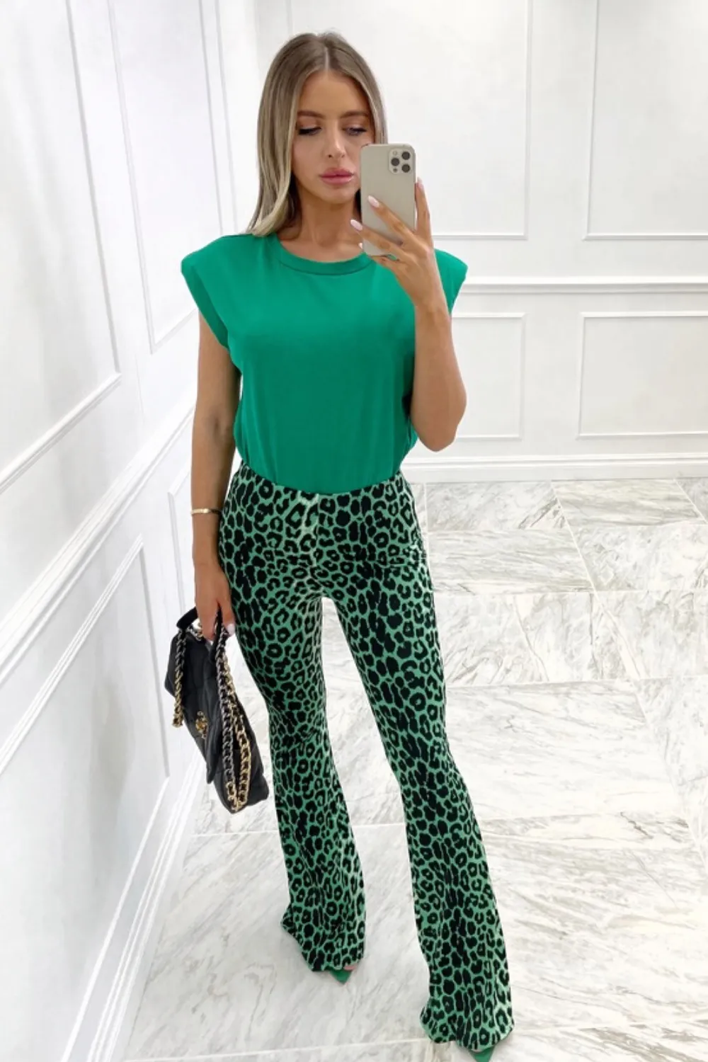 Laurie green animal print flared high waist trousers