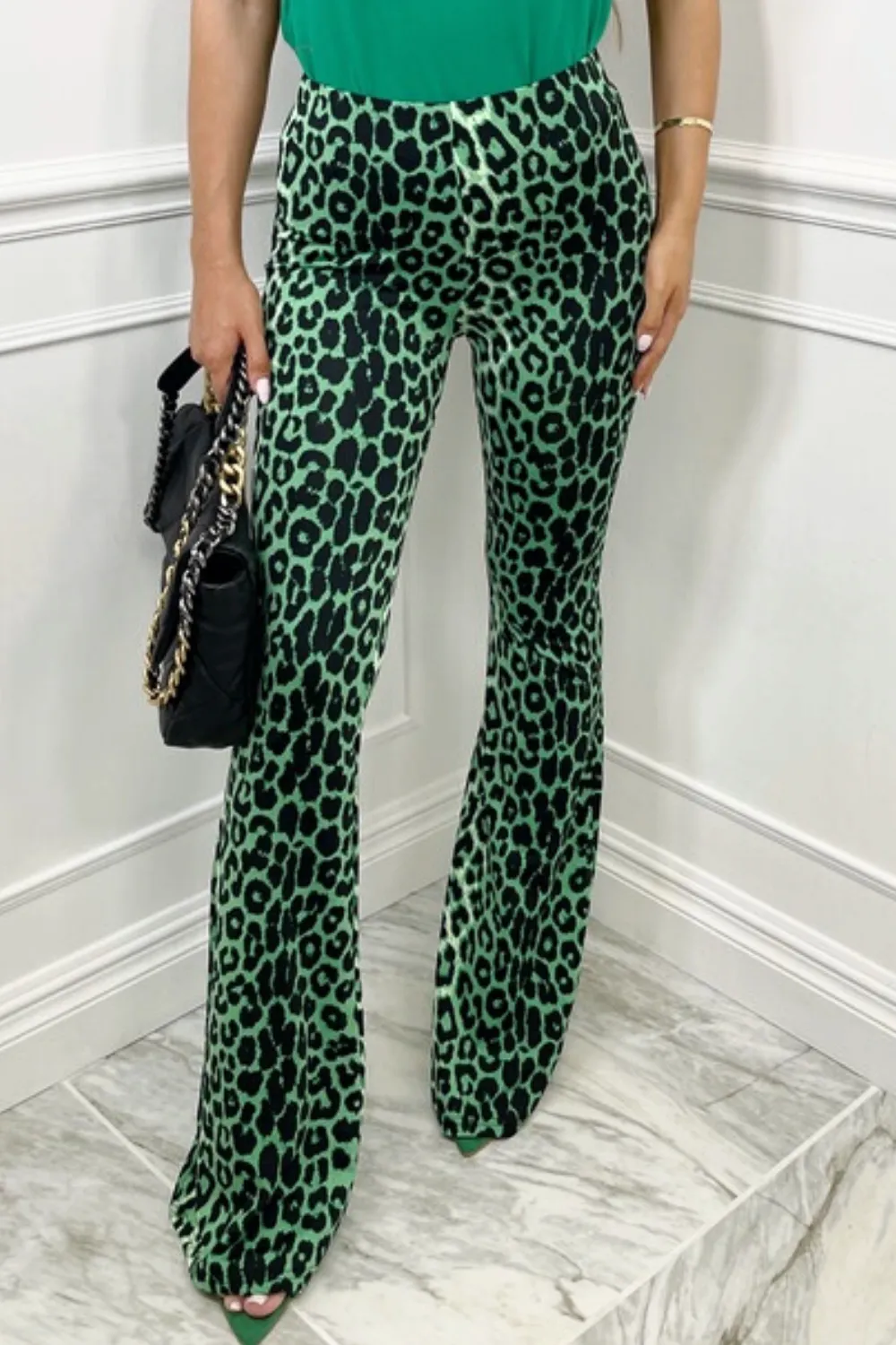 Laurie green animal print flared high waist trousers