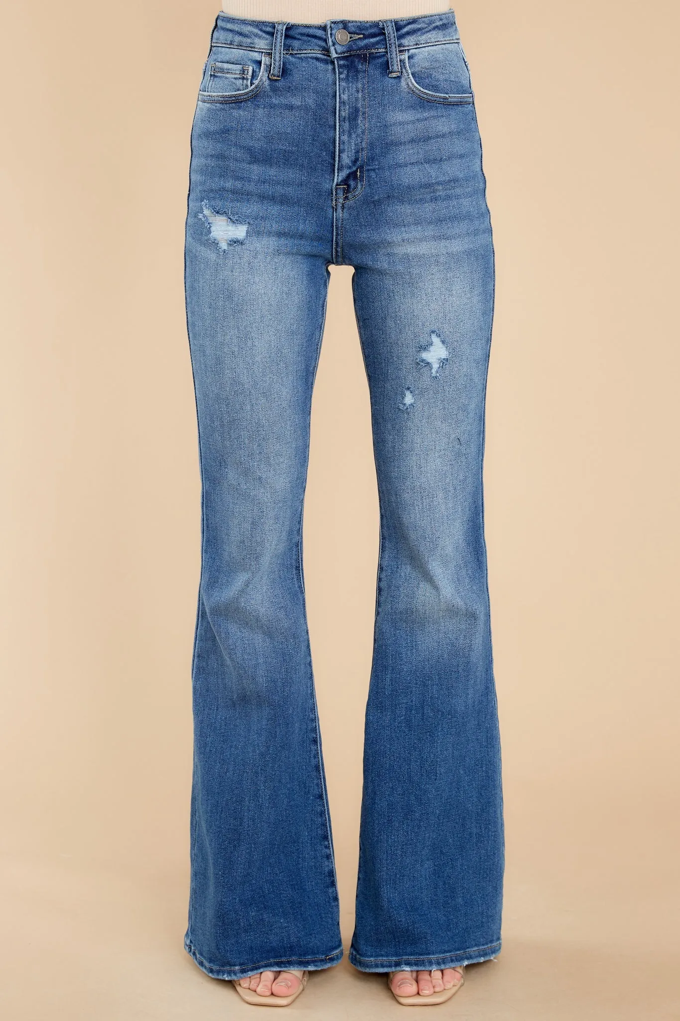 Why So Serious Medium Wash Distressed Flare Jeans